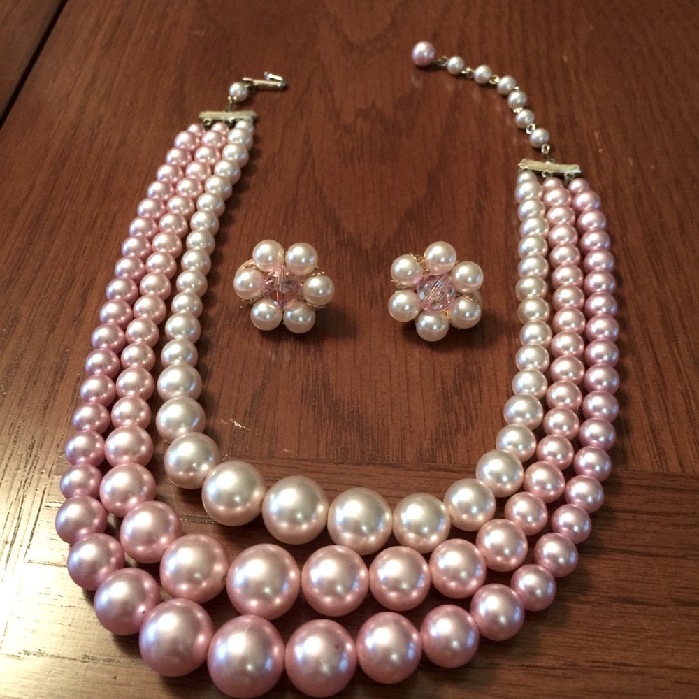 Faux pink pearl 3 strand necklace and earrings.
